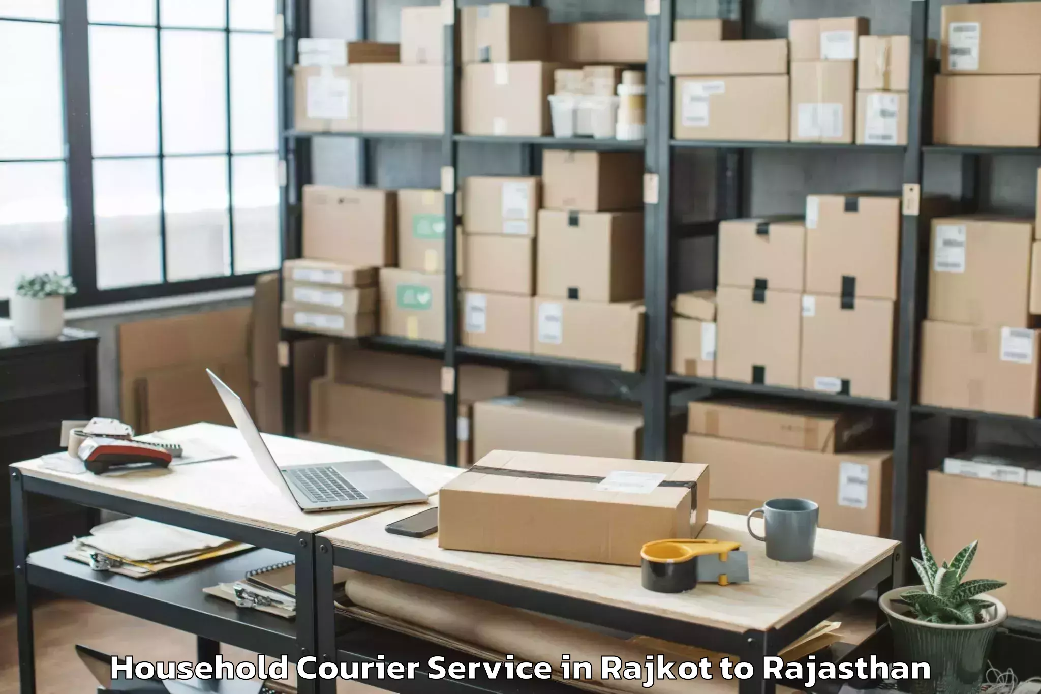 Affordable Rajkot to Maharaja Ganga Singh Universit Household Courier